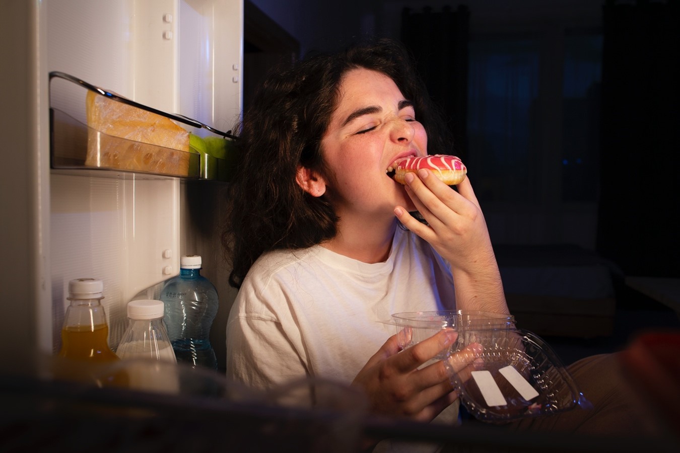 girl eating donut