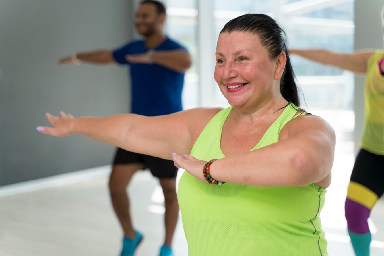 women-smiling-while-doing-excercise-mobile