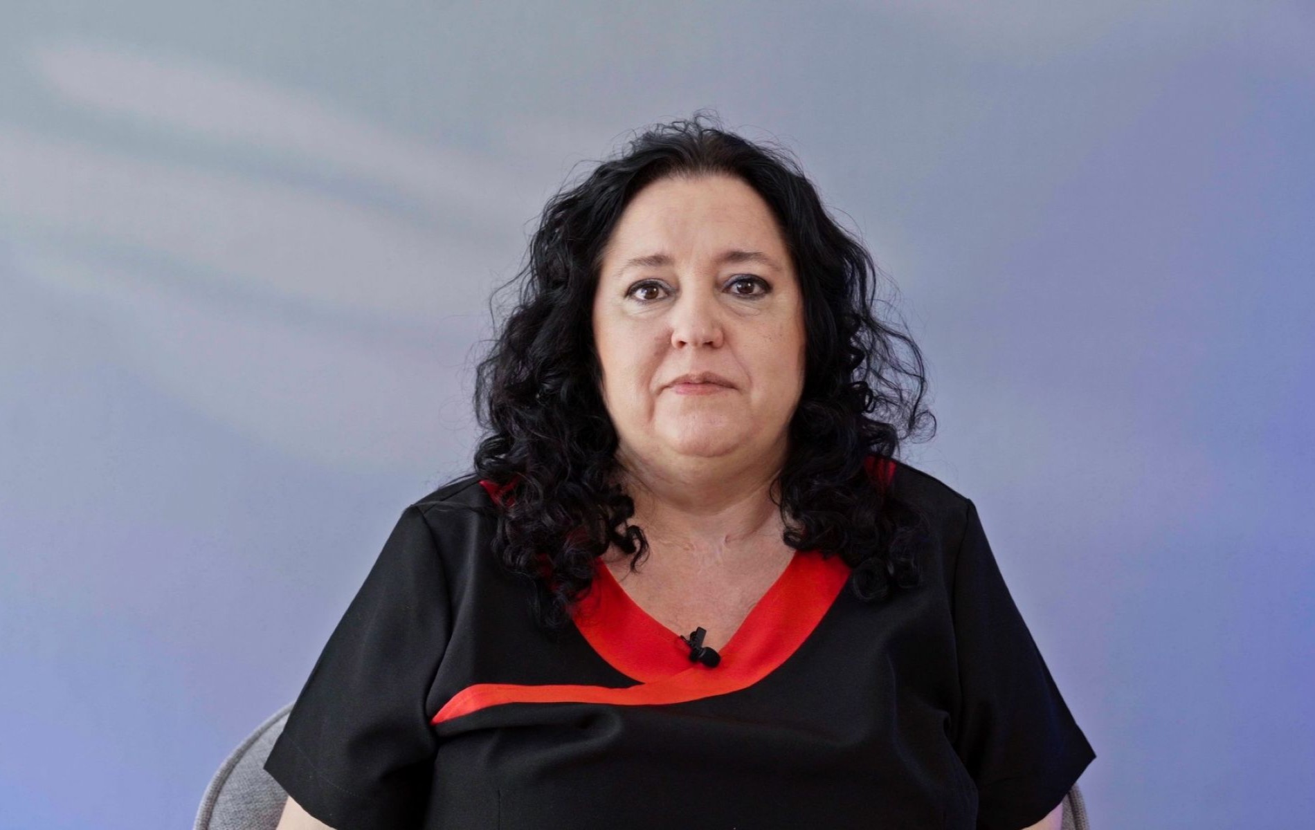 Woman speaking to doctor