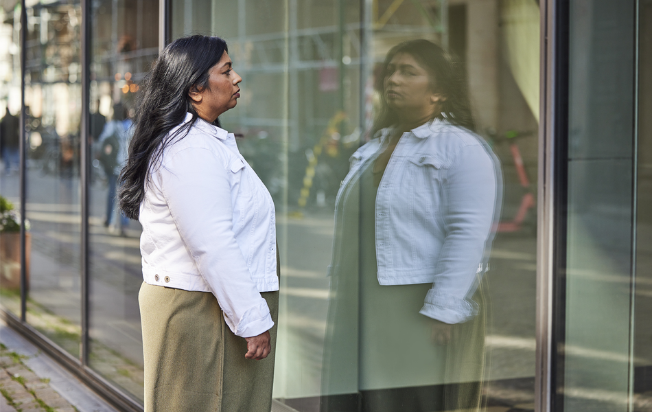 Woman speaking to doctor